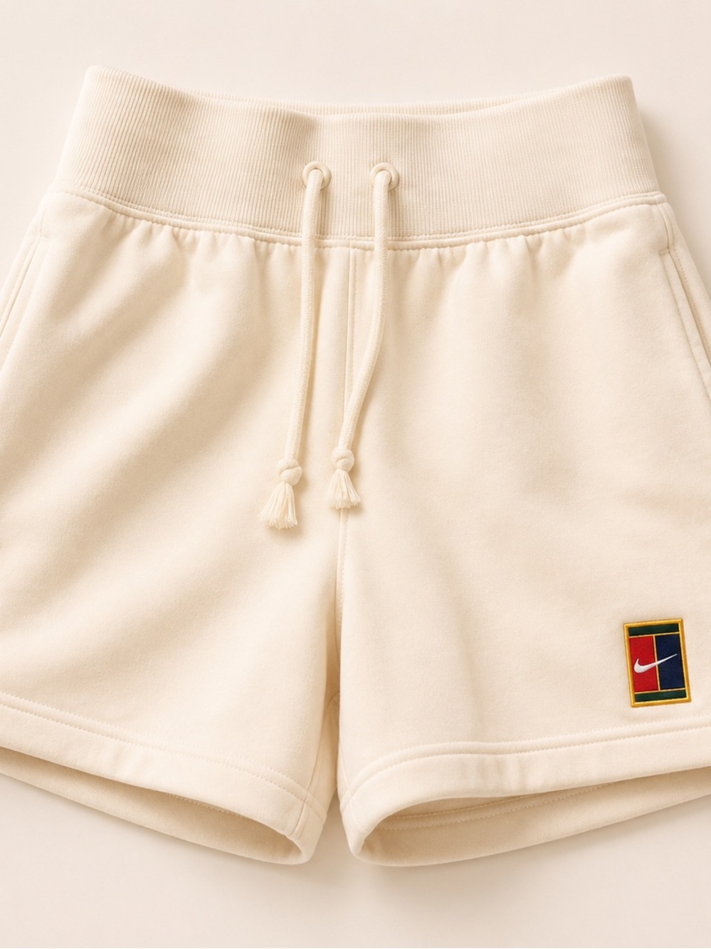 Nike Women’s Cream Athletic Drawstring Shorts with Patch Logo